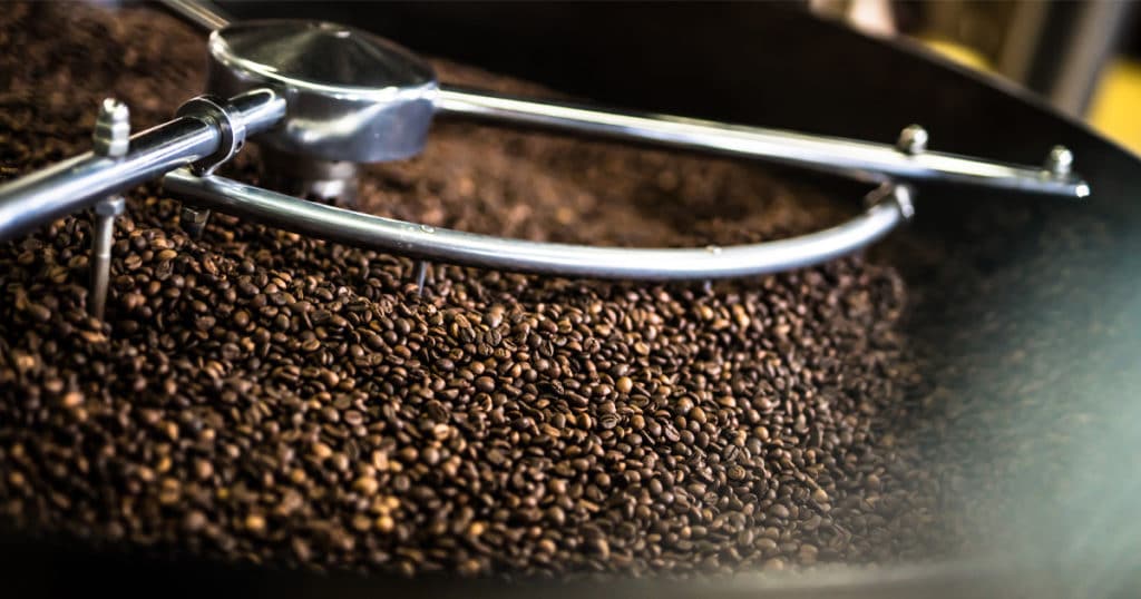 A coffee roasting machine roasting coffee beans