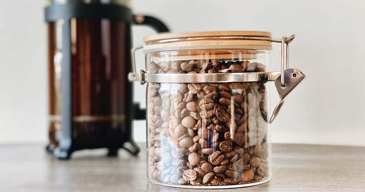 Coffee beans being stored in a jar